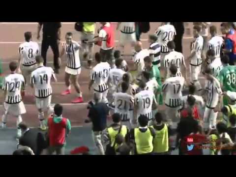 Juventus players celebrate with chinese supporters winning the Italy super cup 2015