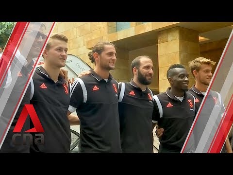 Juventus players greet fans, sign shirts in Singapore